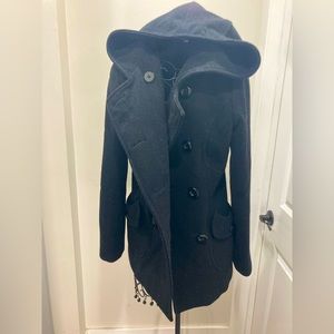 Woman’s fitted hooded black pea coat